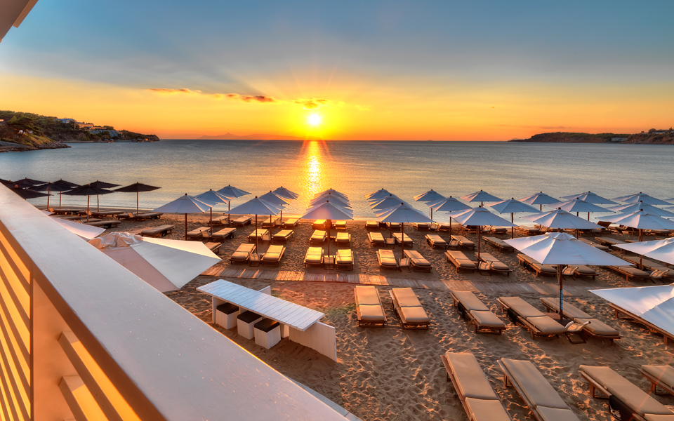 "Sandy Beach on Athens Riviera - Relaxation and Tranquility" Image Text: "Escape to the beautiful sandy beaches of Athens Riviera for relaxation and tranquility."